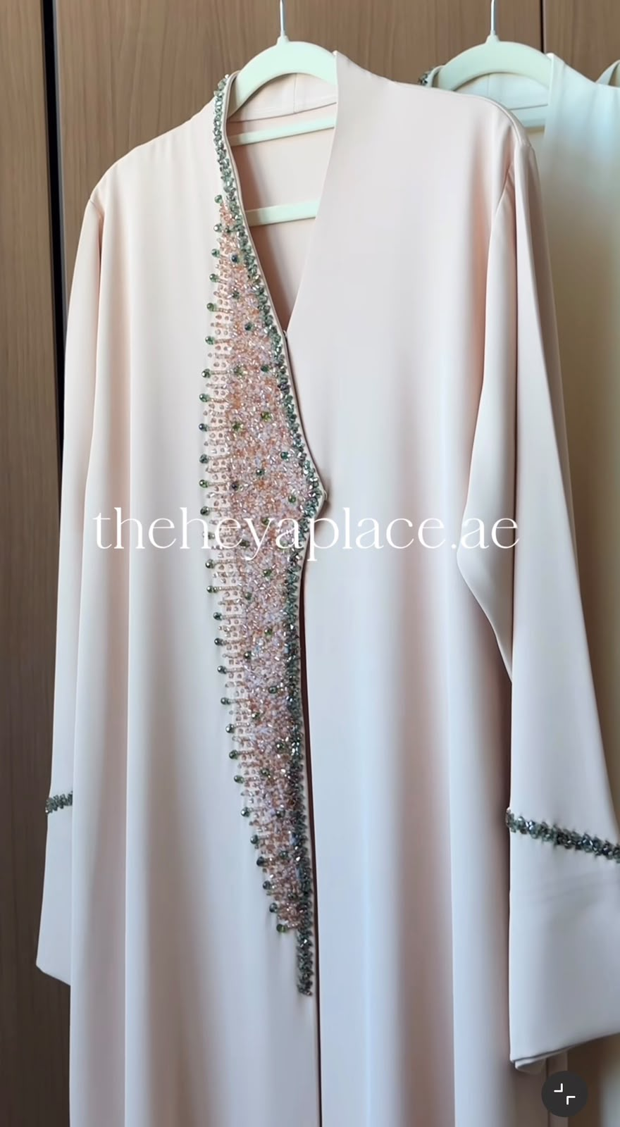 Blush Grace Abaya in soft blush with hand-embellished crystal detailing on the front and sleeves.