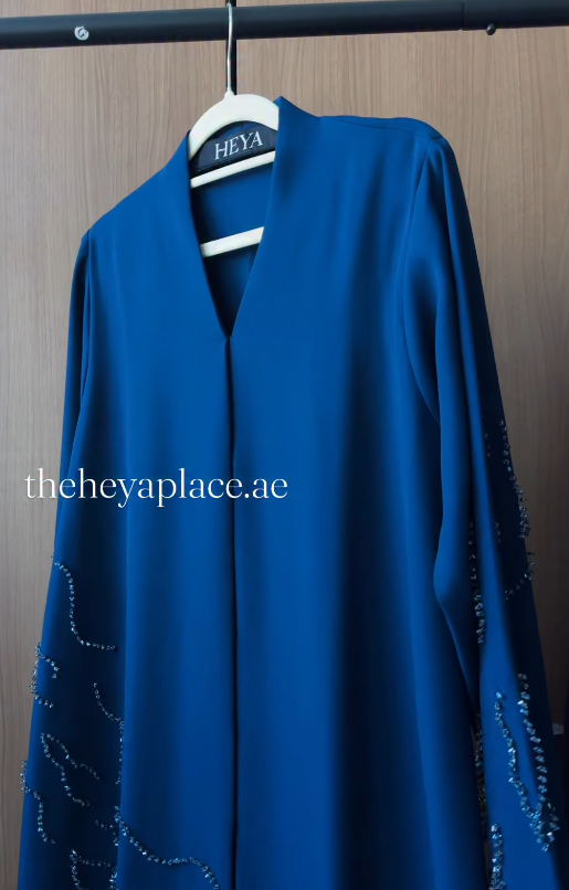 Royal Sapphire Abaya in deep royal blue with shimmering embellished sleeves and an elegant flowing silhouette.