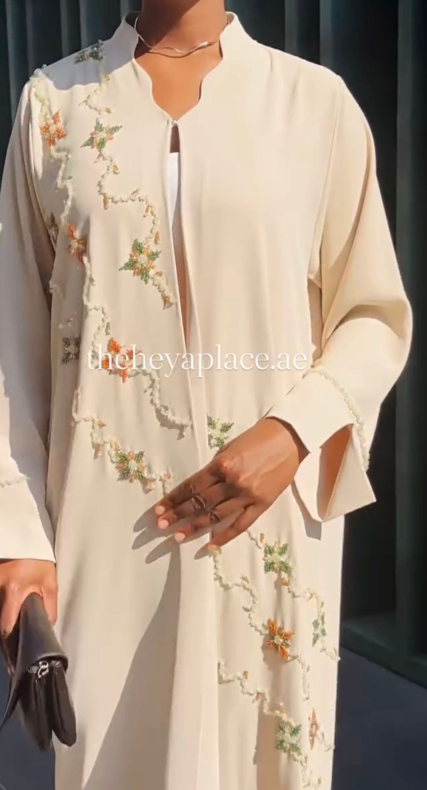 Beige Beaded Abaya with delicate bead embellishments and a timeless modest design.