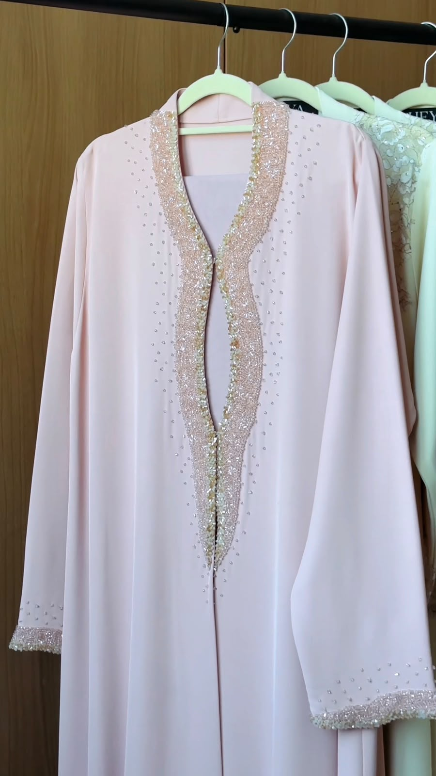 HEYA Blush Radiance Abaya in soft pink with luxury crystal embellished neckline and cuffs