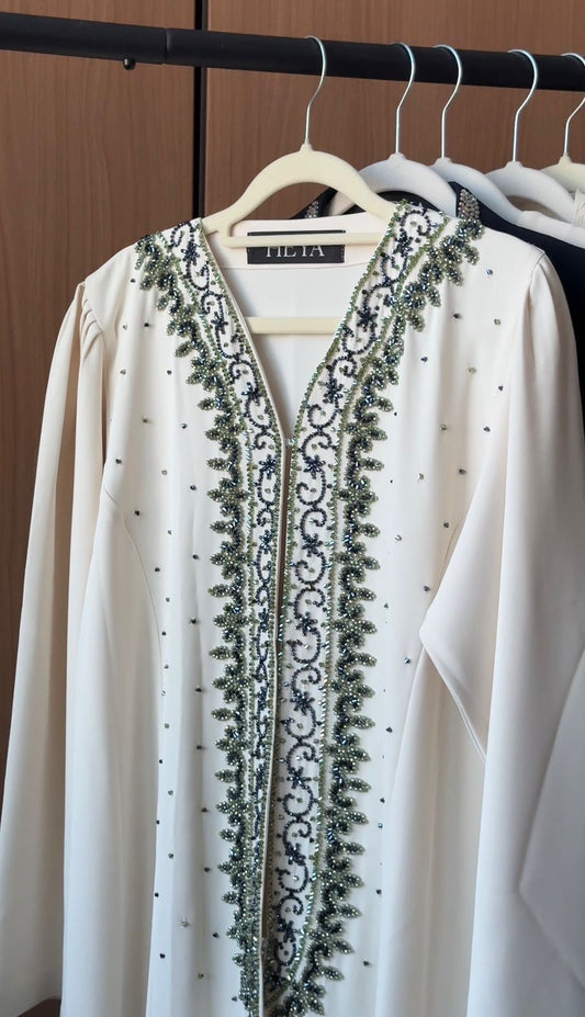 HEYA Emerald Lace Abaya in ivory with emerald beadwork and crystal embellishments