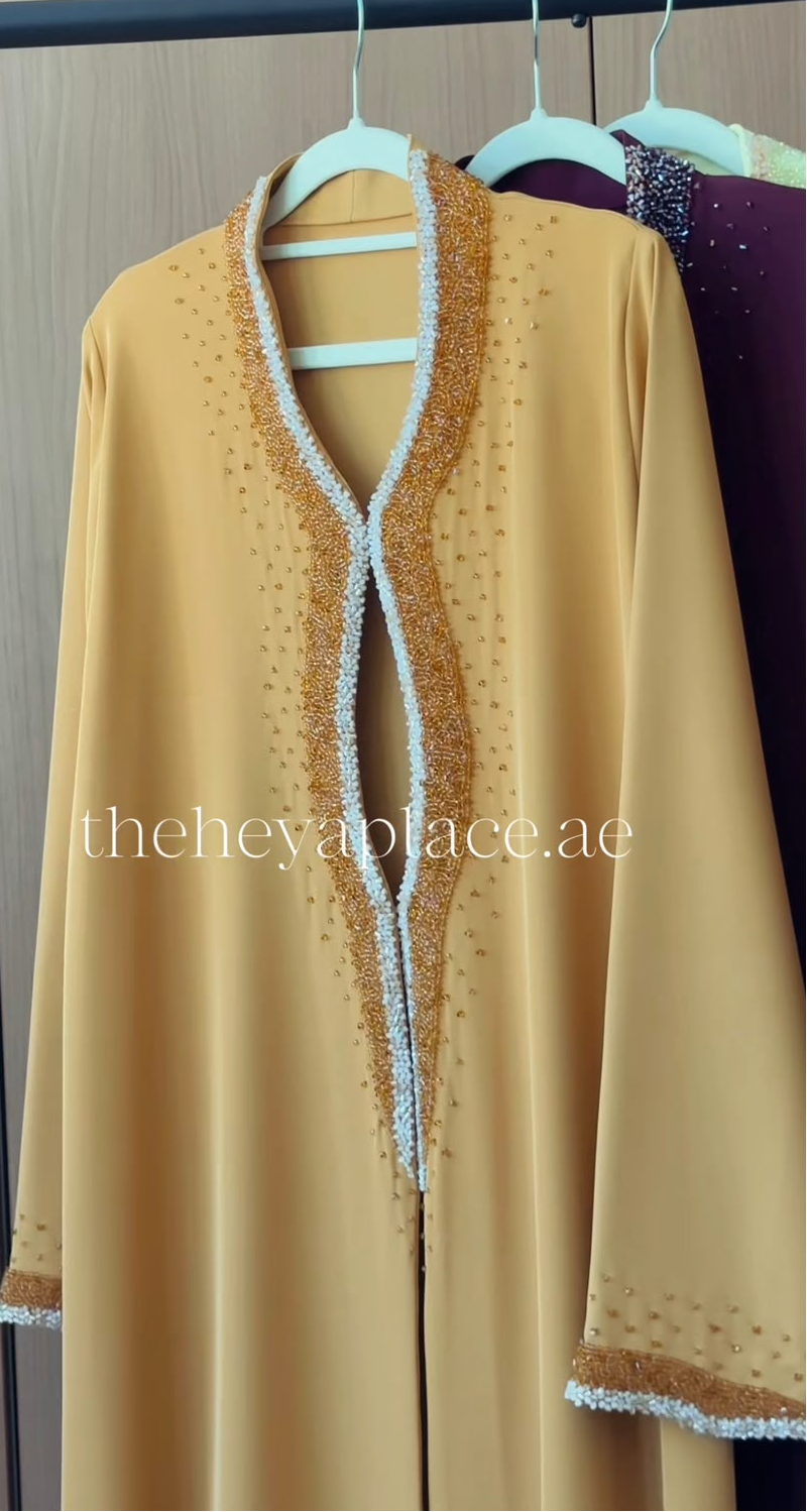 HEYA Golden Pearl Abaya with gold beadwork and pearl embellishments
