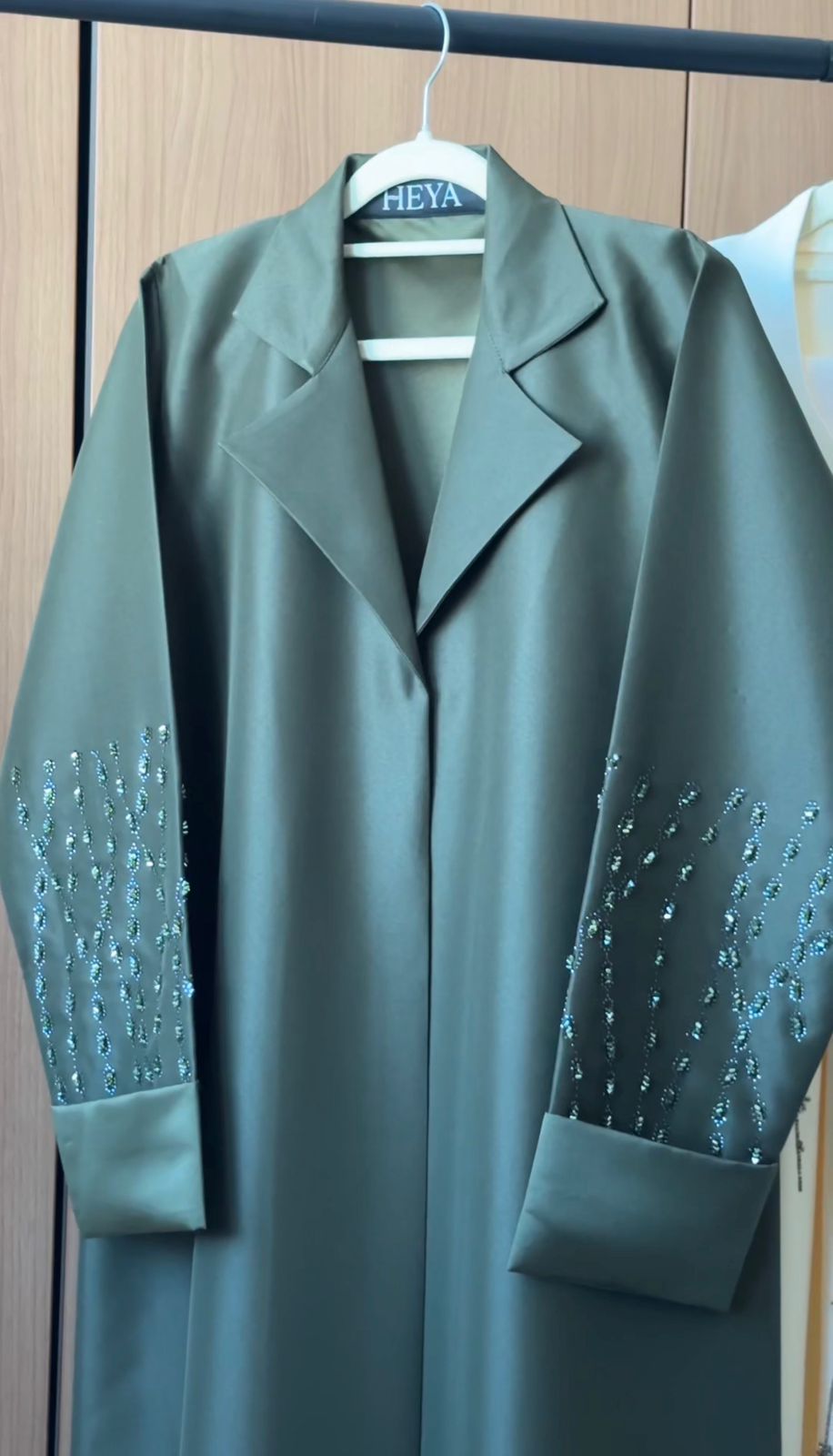 Majestic Forest Green Abaya with an elegant flowing design in premium modest fashion.