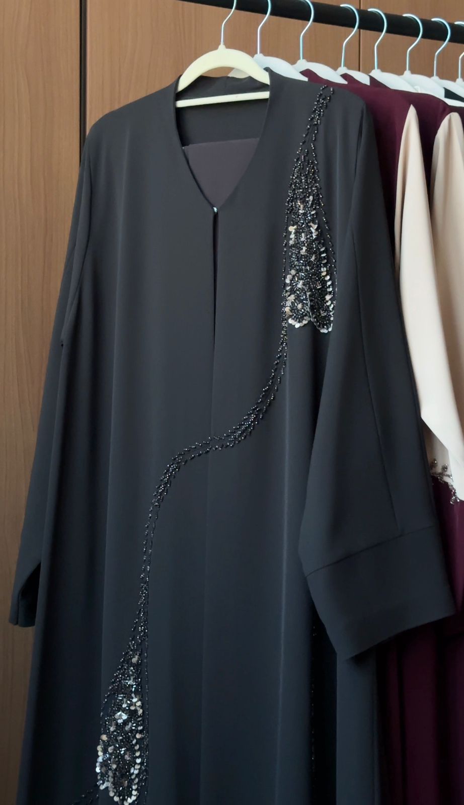 HEYA Midnight Feather Abaya with crystal feather embellishments and cascading beadwork