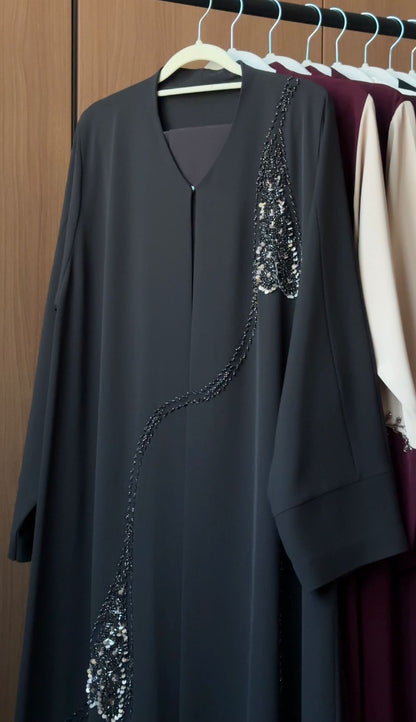 HEYA Midnight Feather Abaya with crystal feather embellishments and cascading beadwork