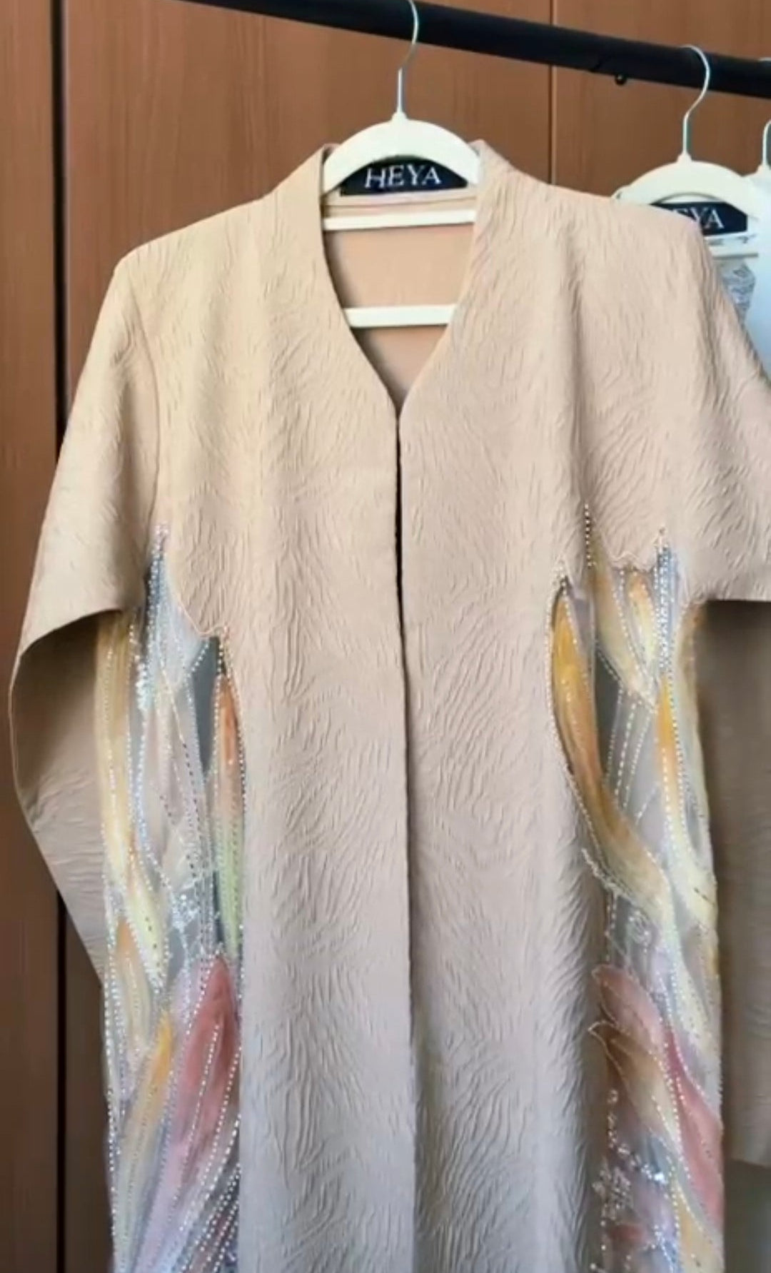 HEYA Pastel Wave Abaya with multicolor pastel crystal embellishments and textured beige fabric