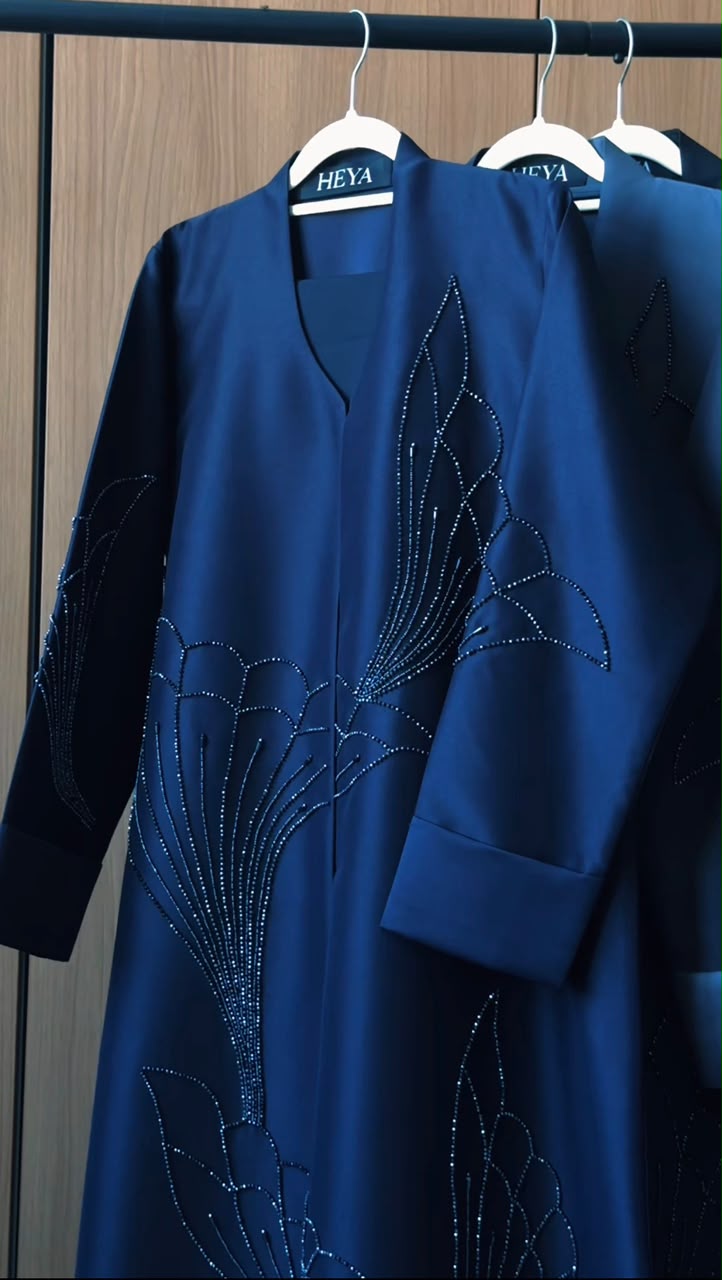 Rawdah royal blue abaya with floral-inspired crystal embellishments by HEYA