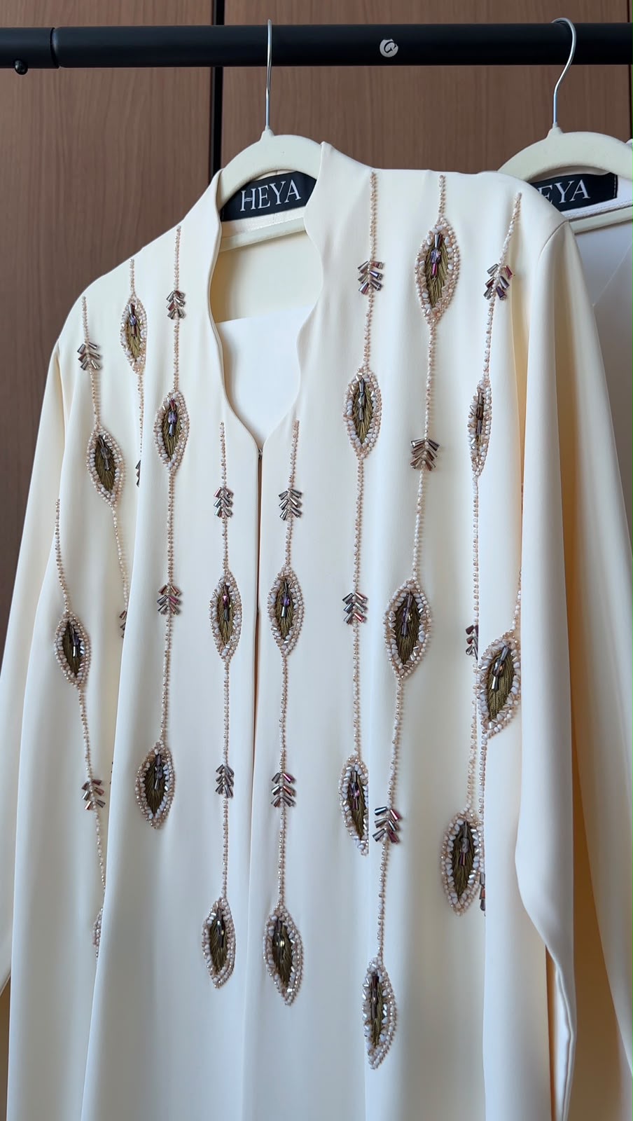 Swan Beige Abaya crafted from premium fabric with a timeless flowing design for women.